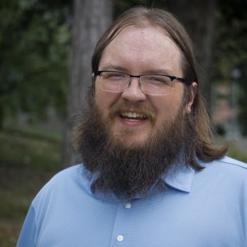 Portrait of Dr. Forrest Bowlick, smiling.