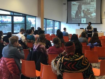 [Image: Nyeema Harris of the University of Michigan gives a BRiDGE2Impacts presentation entitled “The Fierce Urgency of Now to Redefine Impact in Academia” at the University of Massachusetts Amherst in October 2018. Credit: Benjamin Keisling]