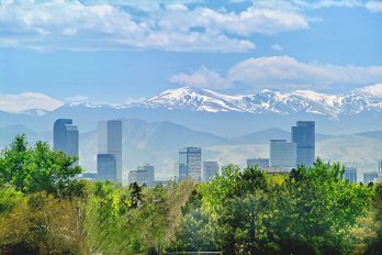 The Denver skyline with the Rocky Mountains in the background